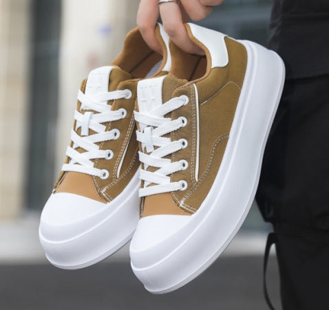 Lifestyle shot of a man wearing versatile streetwear low-top sneakers outdoors.